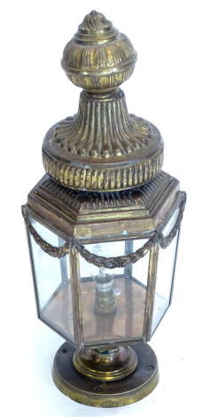 A gilt brass electric lantern, with hexagonal sides and mount for a newel post, 55cm high. Provenance: The Estate of Miss Rachel Monson.