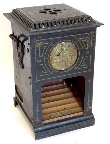 A late 19thC aesthetic movement Rippingilles patent copper and iron stove, decorated with a panel of stork rushes etc., in gilt 56cm high, 36cm wide.