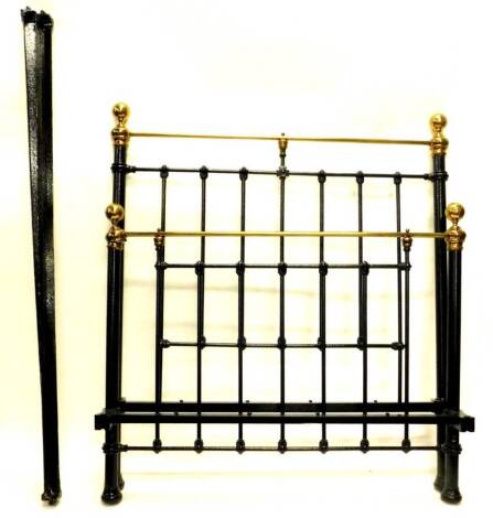 A Victorian brass and iron double bed head and foot, with turned finials, side rails, etc., 136cm wide.