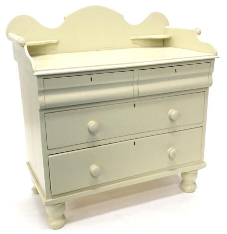 A Victorian painted pine washstand, with shaped raised gallery above two short and two long drawers on turned legs, 94cm wide.