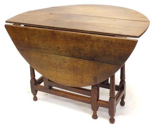 An 18thC oak oval gateleg table, on turned supports, 110cm wide. Provenance: The Estate of Miss Rachel Monson.