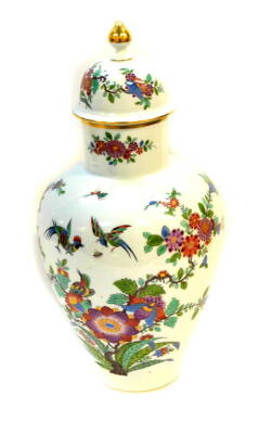 A Meissen porcelain vase and cover, kakiemon decorated with Indianische Blumen, number 482110/55, painted and impressed marks, 47cm high.