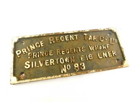 An LNER white painted cast iron sign 'Prince Regent Type Co Ltd', Prince Regents Wharf, Silvertown, E16., No 83, 20.5cm high, 51cm wide.