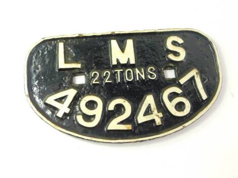 A cast iron wagon plate, white painted high relief, 'LMS, 22 tonnes, 492467'., 28.5cm wide.