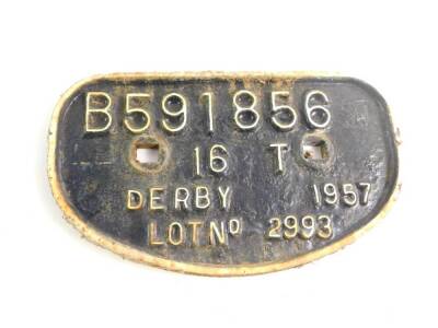 A cast iron wagon plate, white painted high relief, 'B591856, 16T, Derby 1957, Lot No 2993'., 28cm wide.