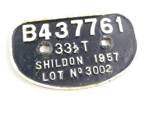 A cast iron wagon plate, white painted high relief, 'B437761, 33 1/2T, Shildon 1957, Lot No 3002'., 28cm wide.