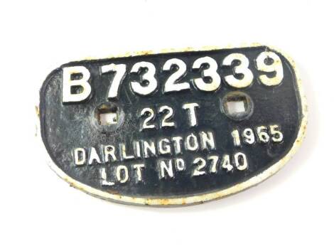 A cast iron wagon plate, white painted high relief, 'B72339, 22T, Darlington 1955, Lot No 2740'., 28cm wide.