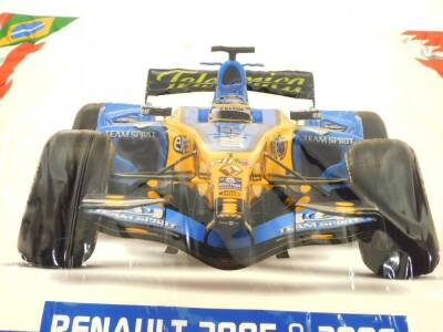 A Renault Formula 1 laminated poster, 'Renault 2005 and 2006 F1 World Champions, Official Merchandise On Sale Here'., 117cm high, 150cm wide. - 2