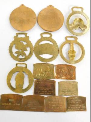 A pair of Slievemamon brass motorcycle medals, 1998 - 1999, named to D H Davis, on a 1924 AJS., eight brass International Reliability Trial badges, and five Sunbeam MCC horse brasses. (15) - 2