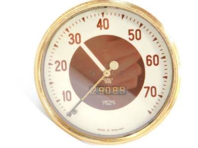 A Smiths Rev meter, believed to be for a Morris Ten, brown and white dial, serial no 53186/1/1600, 10cm diameter. - 2