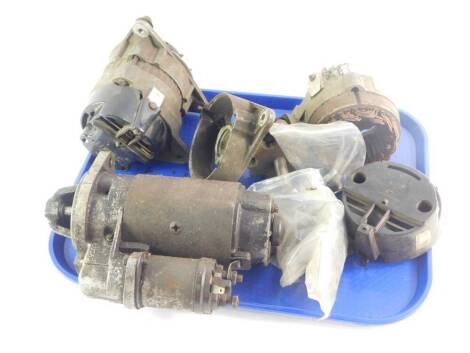 A Lucas starter motor, serial no 25647J, and further car parts. (a quantity)