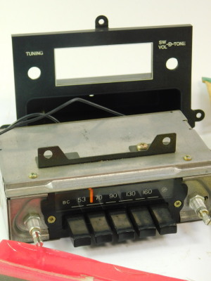 A 1970's Toyota motor tool wrap, Honda radio and another. (3) - 2