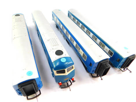 A Hornby Triang OO gauge diesel Pullman motor car type 2, blue livery, W60095, R55, boxed, further motor car W60097, Pullman parlour car type six, R426, boxed and a restaurant car, W60745. (4)