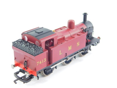 A Hornby OO gauge tank locomotive, LMS red livery, 0-6-0T3F, 7413, R2674, boxed, together with a Great Western locomotive, 0-6-0-2788, and an LNER locomotive, 0-4-0, 6 (3). - 4