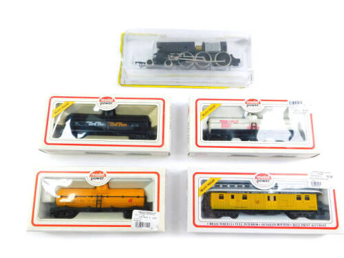 A Bachmann OO gauge locomotive chassis, 4-6-0, model power old time wooden passenger car, Denver and Rio Grande with a Western tank car, Hudson's Bay Oil and Gas, chemical tank wagon, Michigan Alkaline Company and another tank train, all boxed. (5)