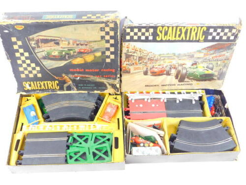 A Scalextric model motor racing set 50, and a further set numbered CM.33, both boxed. (2)