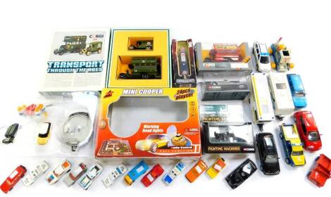 A Corgi die cast Transport through the Ages set, Fighting Machines, Operation Overlord utility vehicle, Thorneycroft bus, and a Jaguar XK120 soft top, together with a Zap Toys Mini Cooper two piece play set, incomplete, and further die cast and other vehi