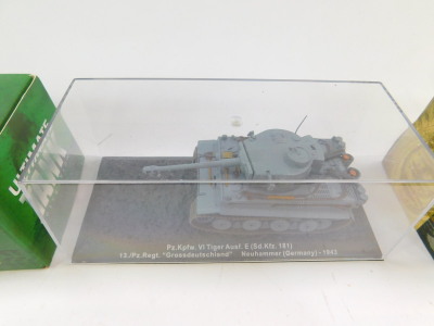 Oxford and Atlas die cast models of military tanks and vehicles, including an M4 Sherman, VI Tiger Tank, jeeps, trailers, field guns, etc., all boxed. (quantity) - 8