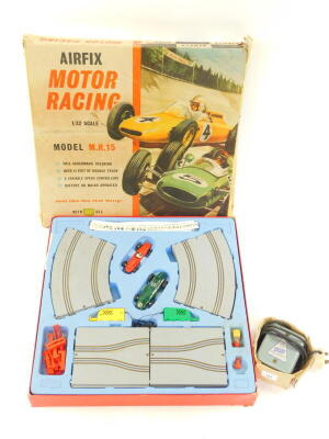 An Airfix Motor Racing set, scale 1:32, model MR15, boxed, together with an Airfix power unit. (2)