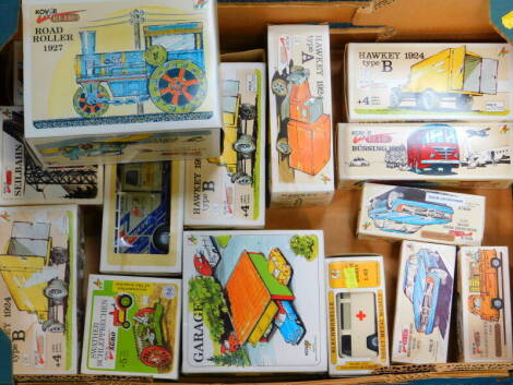 Kovap retro tin plate vintage trucks, steam engine cable car and further vehicles, all boxed. (a quantity)