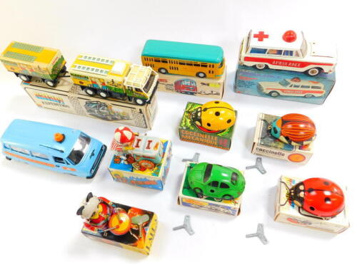 Chinese Russian and other tin plate toys, including a fire truck, moon explorer, chick carrier, ladybirds, two ambulance, etc. (2 trays).