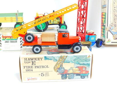 Three Kovap tin plate toys, boxed, comprising a Hawkeye type E 1924, a tractor and trailer and a crane, together with a Russian sports car. (4) - 3