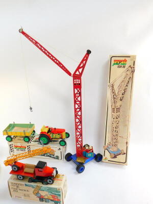 Three Kovap tin plate toys, boxed, comprising a Hawkeye type E 1924, a tractor and trailer and a crane, together with a Russian sports car. (4) - 5