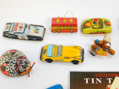 Vintage tin plate toys, including NSFTF bus, ladybirds police car and a sports car, 3D adventures in space, and sundry toys. (1 tray) - 2