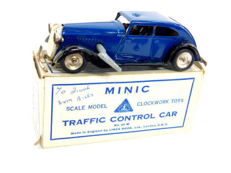 A Minic clockwork traffic control car, number 29M, boxed, with key.