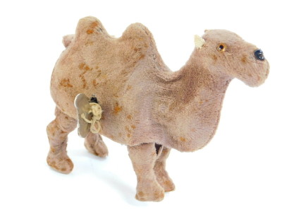 A Japanese vintage mechanical wind up walking camel, with key, 16cm wide.