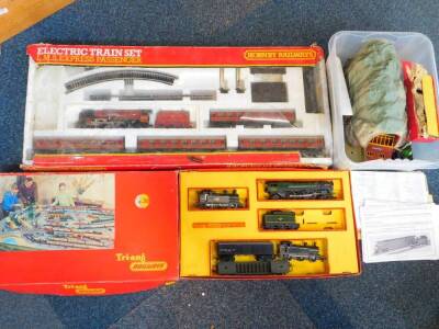 A Hornby electric OO gauge electric train set, LMS Express Passenger, with a 'Duchess of Sutherland' engine, 4-6-2, 6233, incomplete, boxed, together with a steam locomotive 'Britannia', British rail green livery, 4-6-2, 7000, three tank engines, coaches,