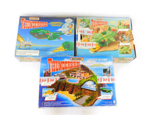 A Matchbox Thunderbirds Tracey Island electronic play set, with electronic rocket sounds and voices, and two Thunderbirds, Thunderbird 2 electronic play sets, with pilot commands and rocket sounds, all boxed. (3)