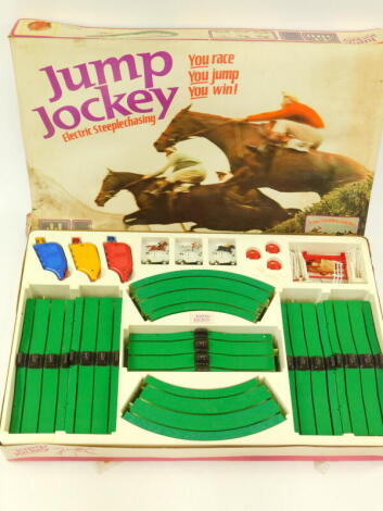 A Jump Jockey electric steeple chasing game, JJ500, boxed.