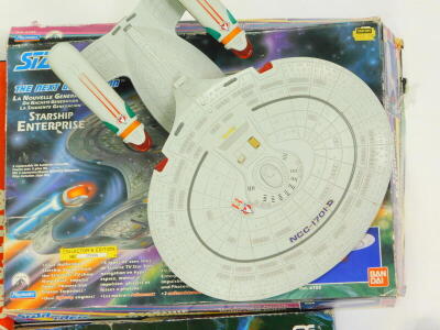 Games and toys, comprising Escape from Colditz, a Batman and Batmobile with rocket launcher, Captain Scarlet Spectrum command team and a Van Day play mates Star Trek, The Next Generation Starship Enterprise, all boxed. (4) - 6