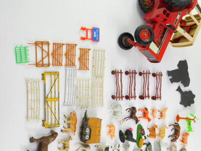 A diecast International 1086 tractor, together with plastic farm yard animals, fencing, further figures, etc. (2 trays) - 6