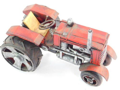 A cast metal model of a tractor, 21cm wide.