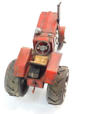 A cast metal model of a tractor, 21cm wide. - 4