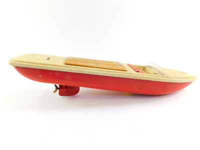 A Distler electromatic 7500 tin plate friction driven motorcar, together with a tin plate speed boat, with stop slow and fast lever control, 43cm wide. (2) - 2