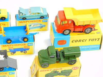 Lesney Matchbox die cast vehicles, boxed, comprising a jumbo crane, 11, hay trailer 40, Ford tractor 39, Land Rover fire truck, 57, Ford Zodiac 53, cattle truck 37, Mercedes Benz "Binz", ambulance 3, police car 55, stake truck 4, and a Dodge wreck truck 1 - 4