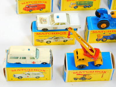 Lesney Matchbox die cast vehicles, boxed, comprising a jumbo crane, 11, hay trailer 40, Ford tractor 39, Land Rover fire truck, 57, Ford Zodiac 53, cattle truck 37, Mercedes Benz "Binz", ambulance 3, police car 55, stake truck 4, and a Dodge wreck truck 1 - 6