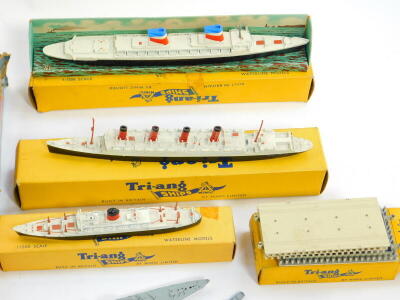 Triang Minic ships, scale 1:1200, some boxed, comprising a Royal Navy carrier task group, RMS Aquatania, SS United States, HMS Vanguard, RMS Saxonia, and HMS Superb, all boxed, further unboxed ships including the Royal Navy, Royal yacht Britannia, ocean t - 5