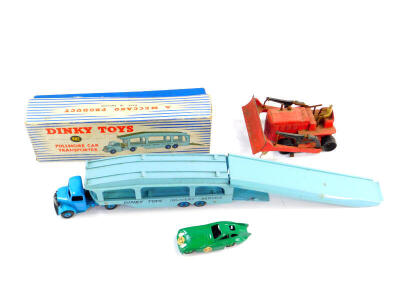 A Dinky toys diecast Pullmore car transporter, number 1982, together with a loading ramp, 994, Bristol 450 sports coupe 163, all boxed, and a Dinky Blaw Knox bulldozer, unboxed. (4)