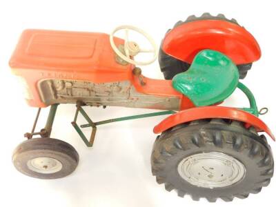 A Tri-ang ride on pedal tractor, red and green, 97cm wide. - 3