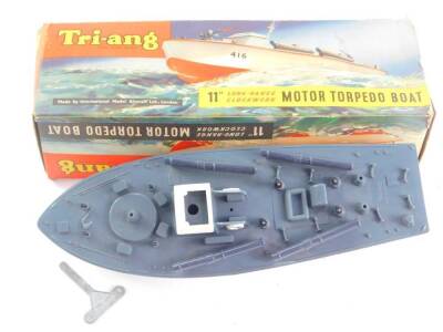 A Triang clockwork motor torpedo boat, 11 inches long range, cat number 4165, with key, boxed.