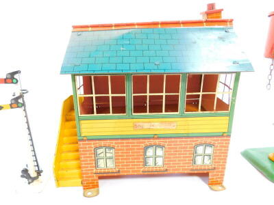 A Hornby O gauge number 2 signal cabin, A835, together with a number one water tank, A101, both boxed. (2) - 3