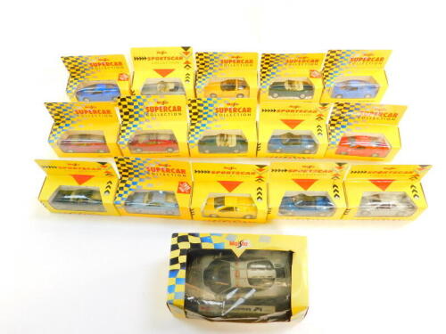 A Maisto die cast Super Car collection, including a McLaren F1 road car, Bugatti EB110, and a Lotus Esprit, all boxed. (15)