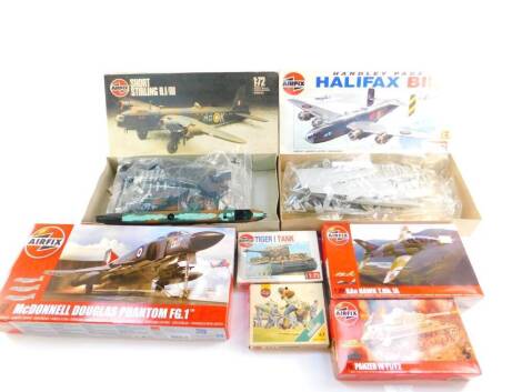 Airfix model kits, comprising a Panzer IV FI/FII tank, scale 1:76, McDonnell Douglas Phantom FG1, Handley Page Halifax BIII, Short Stirling B.1/111 Hawk T Mk1A, and a Tiger I tank, all scale 1:72, together with RAF personnel, all boxed. (7)