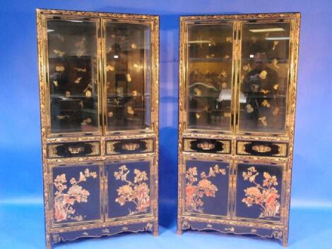 A fine pair of early 20thC Chinese display cabinets