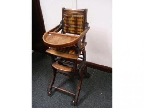 A late 19thC American walnut metamorphic child's low chair