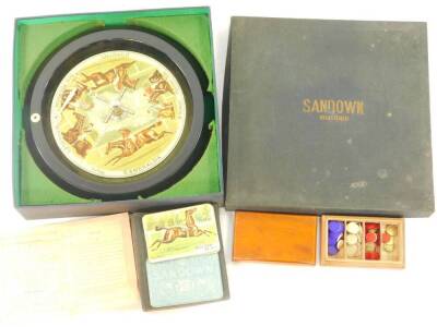 A Sandown Finch Mason Design roulette wheel, printed with horses and jockeys, including Esmeralda, Dorothy and Waverley, together with a box of cards and instructions, and box of gaming counters, boxed.
